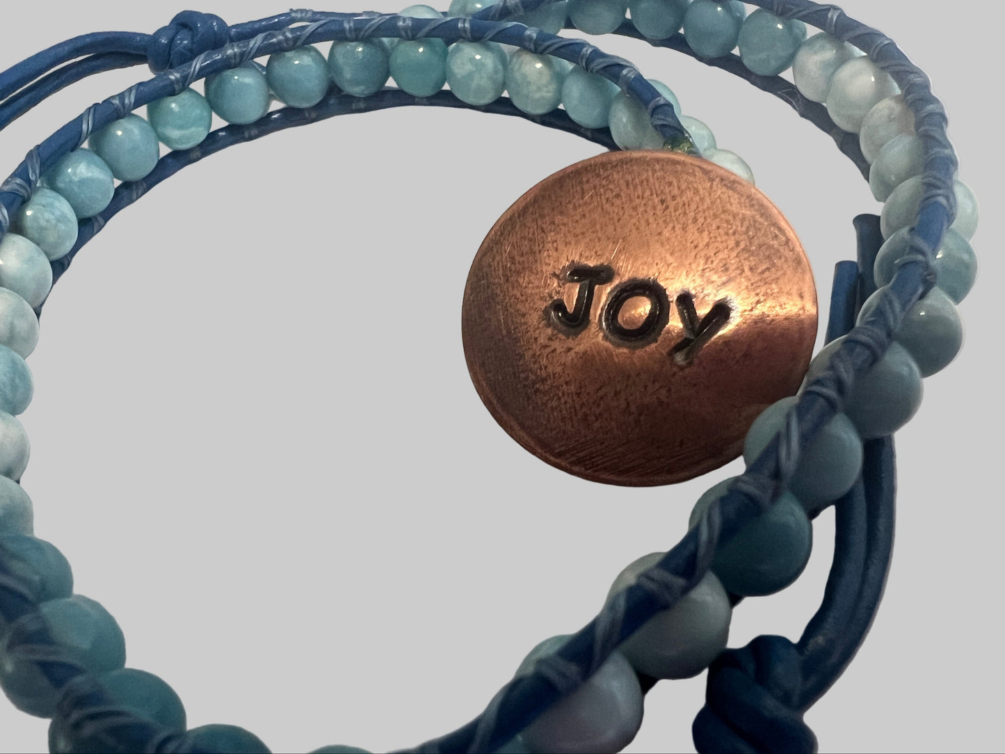 Bracelet with Larimar and copper button.