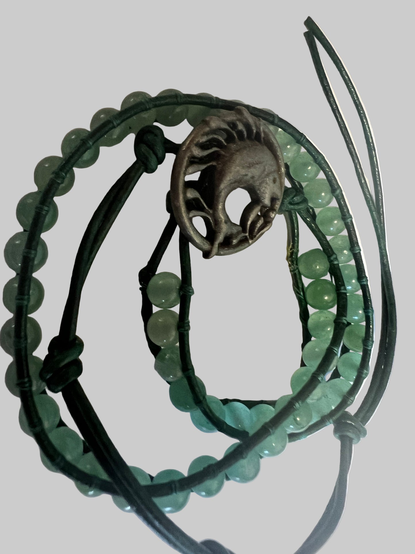Green Aventurine double wrap bracelet with metal fish charm.